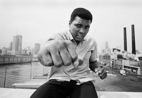 USA. 1966. Muhammad ALI, formerly Cassius CLAY, boxing world heavy weight champion in Chicago, on a bridge