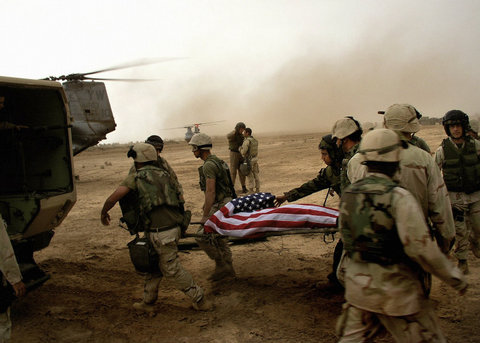 IRAQ. RP26 Camp. 10 miles from the centre of Baghdad. An American soldier killed during the battle for Bag